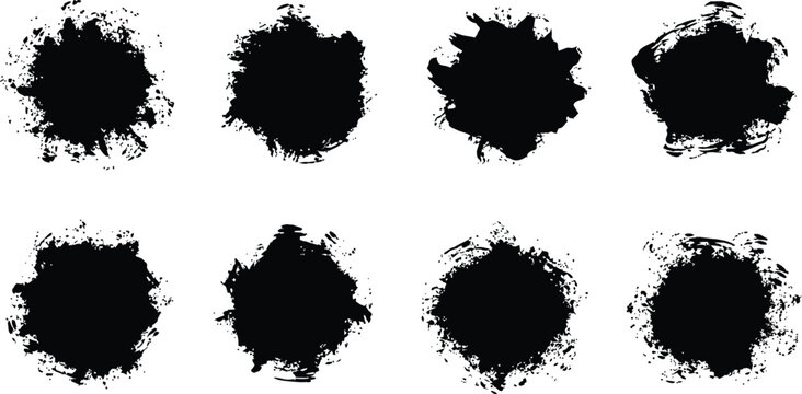 A collection of eight black inkblots on a white background