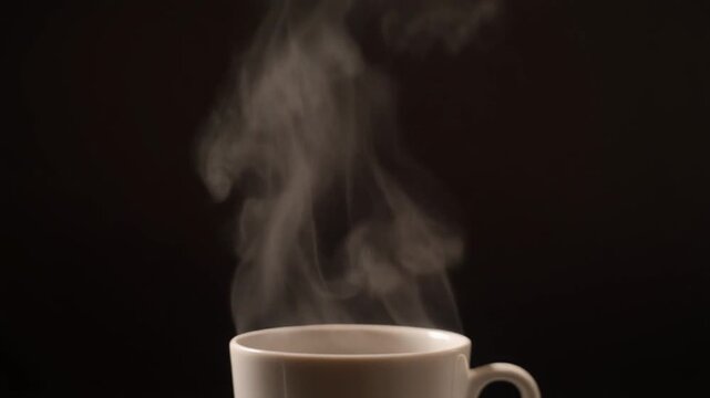 coffee vapor rising, dark background, smooth motion