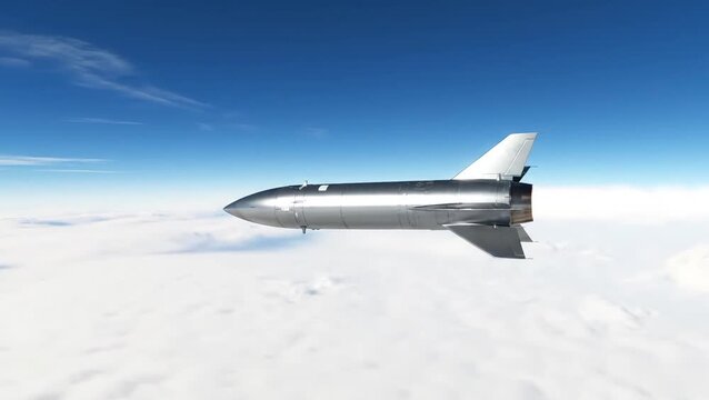 A sleek silver rocket flies high above white clouds against a blue sky