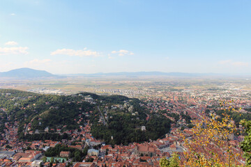 Obraz premium Old town Brasov Romania valley August 2024 Dense medieval architecture