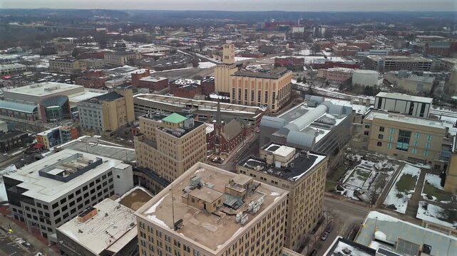 Drone aerial of downtown Akron Ohio buildings and winter cityscape