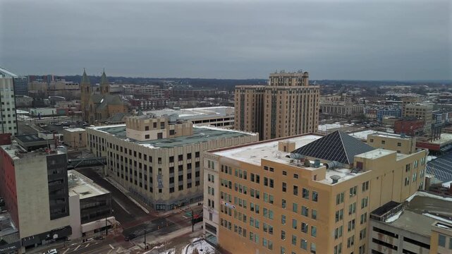 Drone view of downtown Akron Ohio church and office buildings in winter