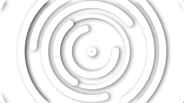 Concentric curved rings forming a minimal 3d paper-cut spiral pattern with soft shadows background animation