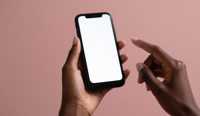 Hands Holding Smartphone with White Screen Against Dusty Rose Background