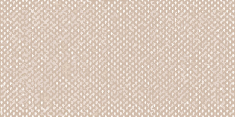 Fototapeta premium Close up of a textured surface with small irregular granular patterns