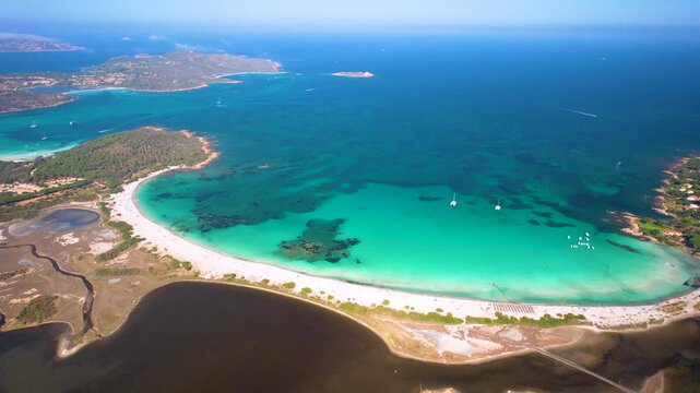 Lu Impostu beach Sardinia Italy panoramic drone view. Scenic turquoise bay and crescent white sand beach. San Teodoro coastal landscape reveal. 4K.