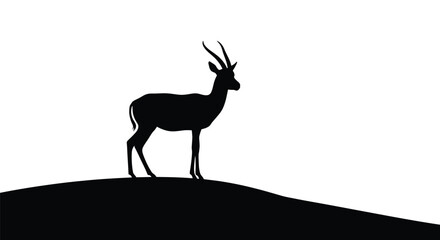 Antelope stands on a hill dramatically presented as a silhouette © MdMosharef