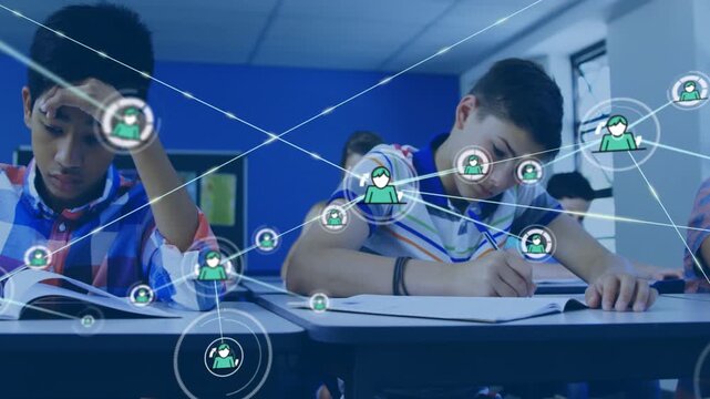 Striped-polo student writing and starting circular HUD, live network linking classroom learning