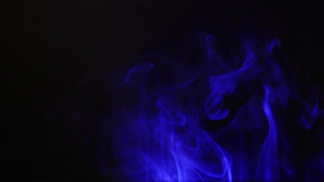 A column of ethereal blue fire or magical smoke rises and swirls on a black background. Seamlessly looping animation perfect for fantasy, Halloween, or as a supernatural effect