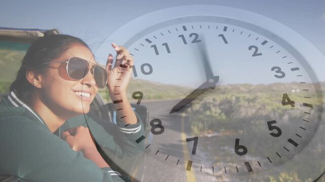 Woman leaning on car door, adjusting shades as car moving, clock overlay rotating, showing travel