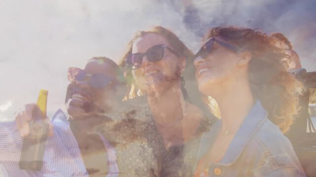 Three friends leaning and turning toward sun as overlay thinning revealing smiles for travel ads