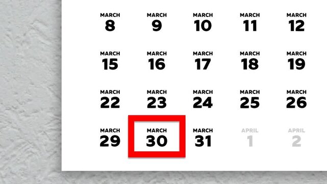 The date March 30th marked with a red cursor on the wall calendar 2026