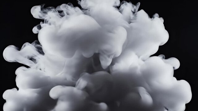 Dense white cloudlike forms swirling in dark space