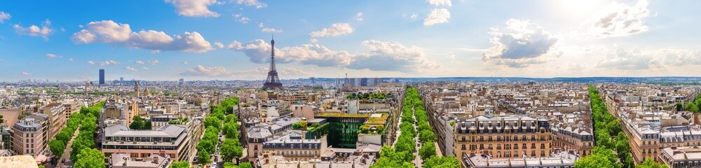 Beautiful skyline full panorama of Paris, view of Eiffel Tower, rooftops and Champs-Elysees