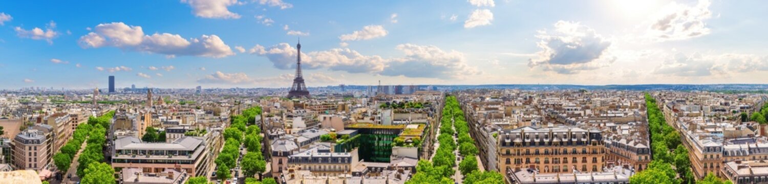 Beautiful skyline full panorama of Paris, view of Eiffel Tower, rooftops and Champs-Elysees