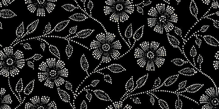 Intricate floral pattern with dotted flowers on a black background