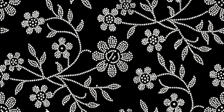 Delicate floral pattern composed of small white dots on a black background