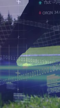 Vertical video: Player entering right, nudging cleat past soccer ball sports HUD analyzing shot