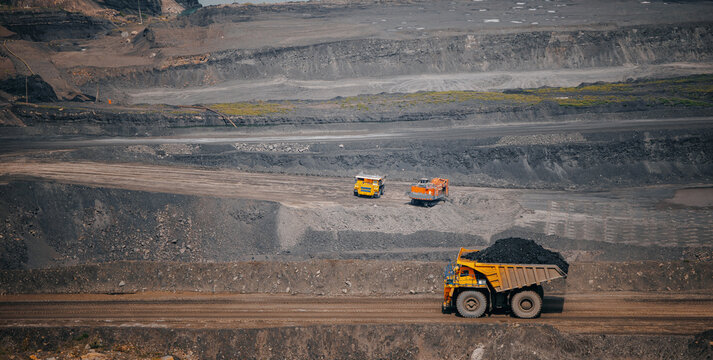 Banner industry landscape, Expansive open pit coal mine with heavy machinery truck
