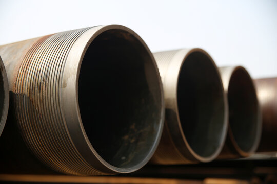 Corroded industrial drill pipes at wellsite