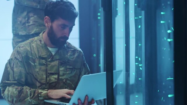 Soldier rapidly analyzing cyber attack signals, Highstakes digital defense with urgent command execution ongoing