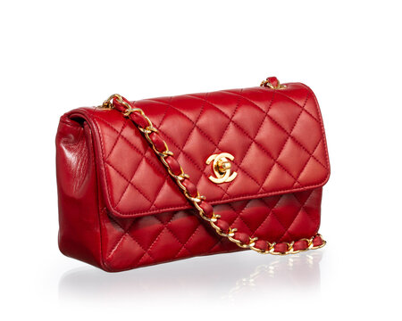 Chanel Mini Flap Vintage bag in red lambskin with gold hardware. Photographed against a white background. Milan, Italy, October 3_2025