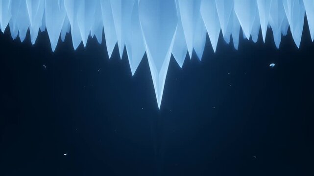 Crystalline snowflake with falling ice particles against a dark background