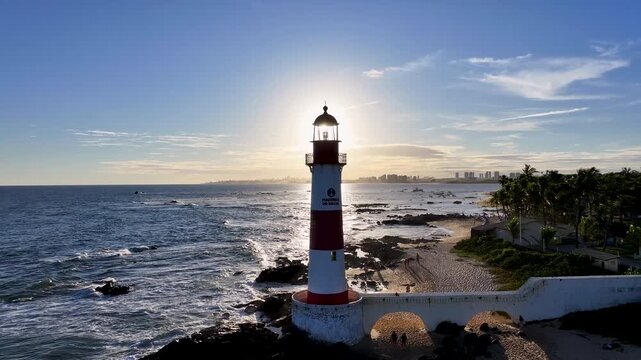 Itapua Lighthouse In Salvador Bahia Brazil. Aerial View Of A Bustling Ligthhouse In A Coast City. Sunset Paradise Island Landscape Heaven Beauty. Paradise Island Coast. Salvador Bahia.