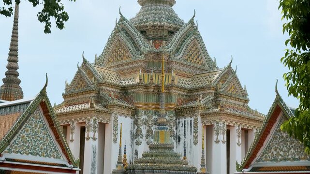 Ornate Wat Pho Thai Temple in Bangkok city with traditional Buddhist architecture in Thailand, Asia. Phra Mondop of Temple of the Reclining Buddha. Popular tourist landmark