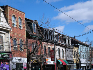 Naklejka premium Facades of old buildings on Queen Street West in Toronto