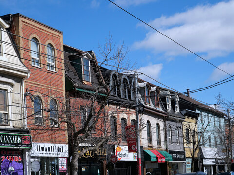 Facades of old buildings on Queen Street West in Toronto