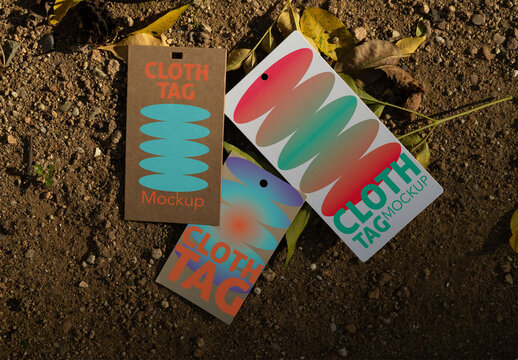 Real photo of three Hang Tags on Ground. PSD template mockup.