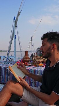 Traveler Reading Book on Cushions in Sunny Resort Environment
