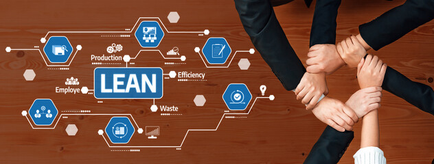 This image depicts a collaborative effort in lean management principles, emphasizing teamwork and...
