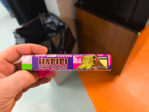 Quebec, CANADA, 25 February 2026 : Habibi, Dubai, Chocolate, Hand, Colorful Packaging