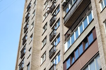Fototapeta premium An old block of flats with balcony soviet building architecture urban background photo 