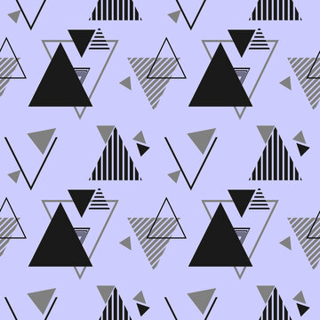 Seamless geometric pattern featuring an array of black, grey, and striped triangles in a modern abstract design on a light purple background