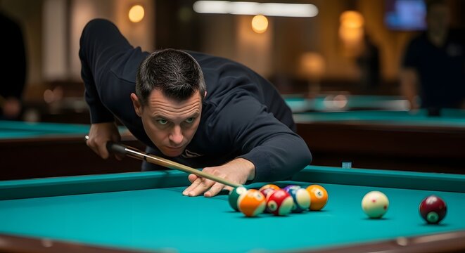 Man in Dark Shirt Playing Pool on Green Table with Cue Stick