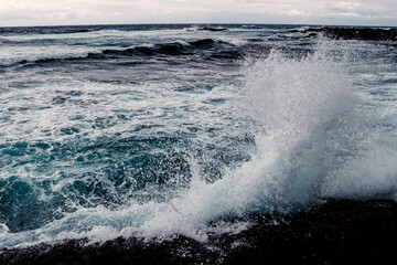 waves crashing on the rocks