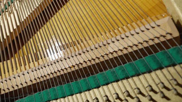 Close-Up Inside View: Upright Piano Strings and Soundboard Detail | Steel Wire Strings with Wooden Dampers and Green Felt | Classical Music Instrument Interior Macro Shot