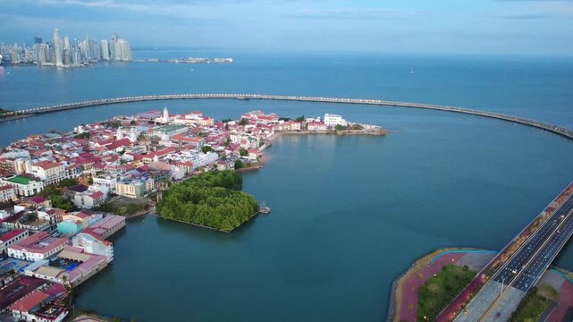 Panama City , Casco Viejo, skyline and Cinta Costera highway bridge over the ocean.