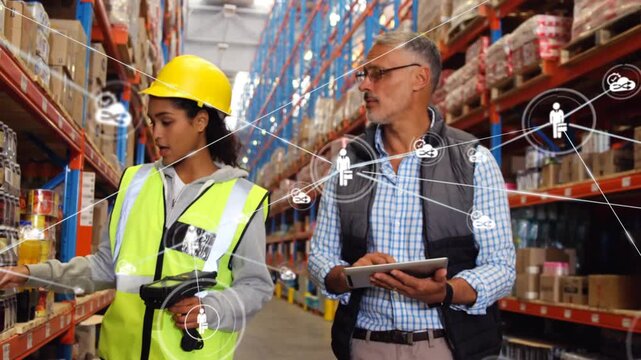 Warehouse woman scanning shelves, initiating network overlay while manager syncing stock on tablet