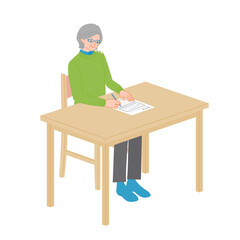 Senior woman filling out application form at desk