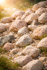 Natural stones and pebbles in warm sunlight, minimal nature texture background