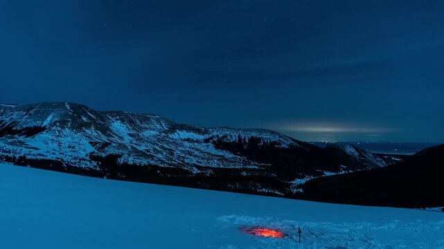 Fire pit in snow winter at night timelapse 