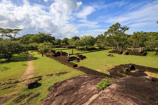 Ancient Stone Wall and Greenery at the Ruins of Polonnaruwa, Sri Lanka