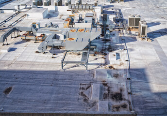 Aerial View of an Industrial Rooftop in Harsh Sunlight.