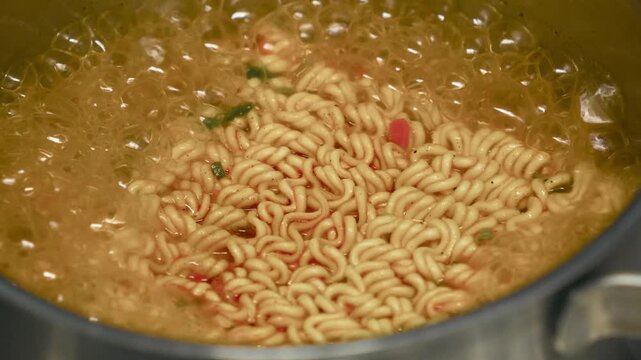 Cooking spicy hot korean ramen soup
