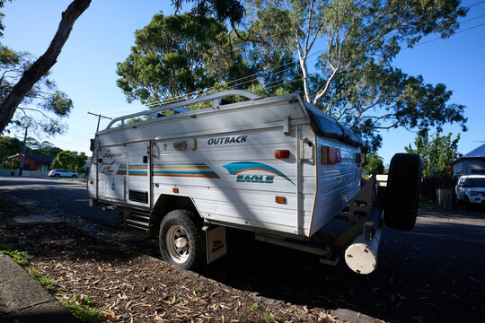 White Jayco Eagle Outback single axel caravan parked on a suburban street during the day