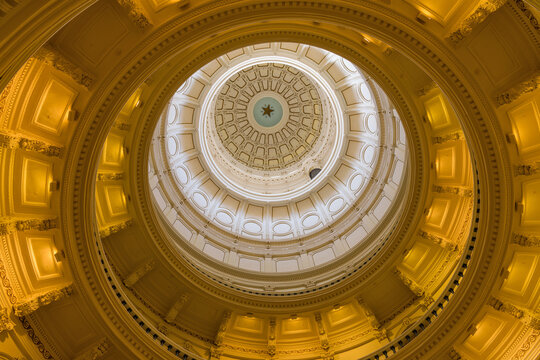 Interior of The Dome of Texas State Capitol - A low-angle and wide angle interior view of the dome and rotunda of Texas State Capitol Building. Austin, Texas, USA.